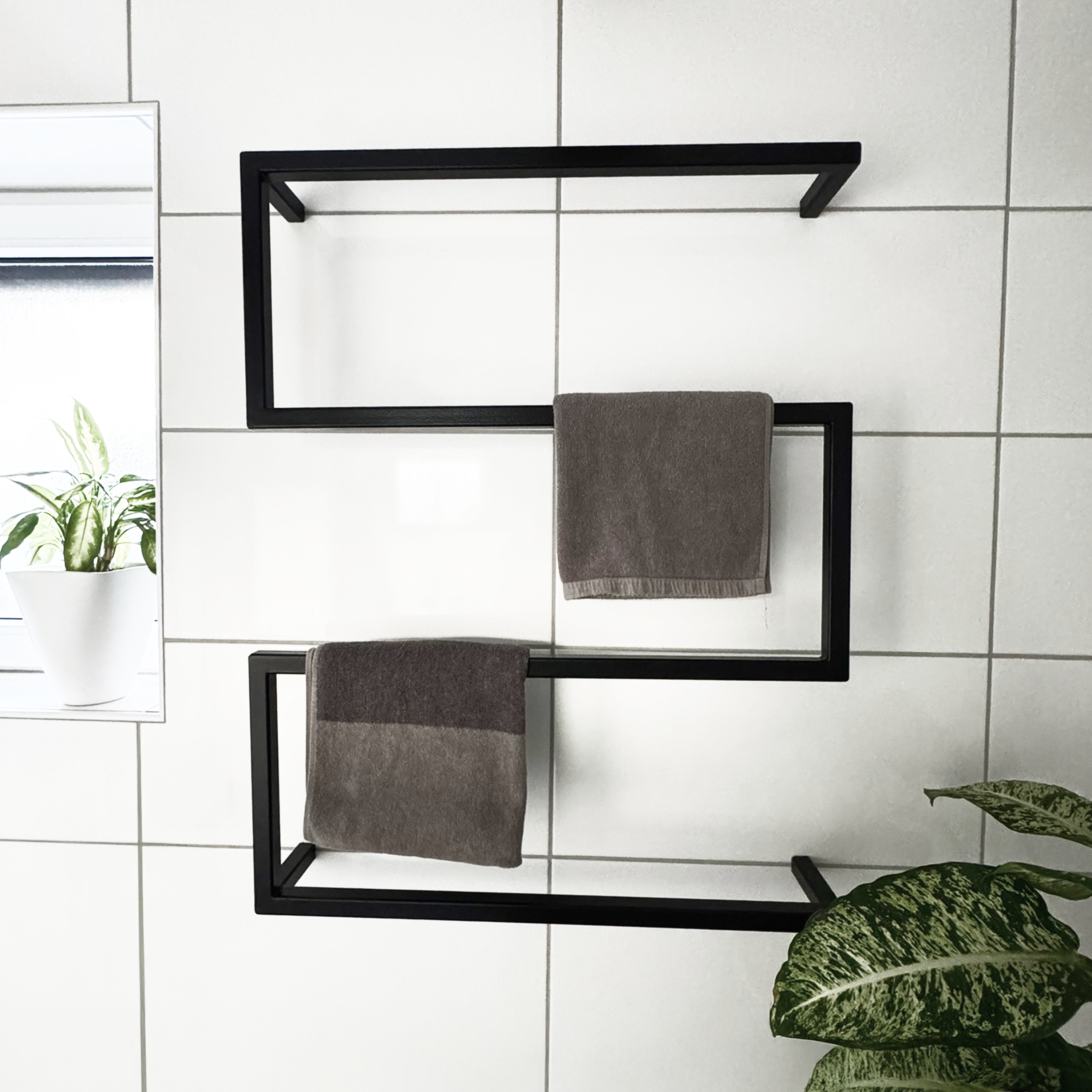 Design towel holder made of metal