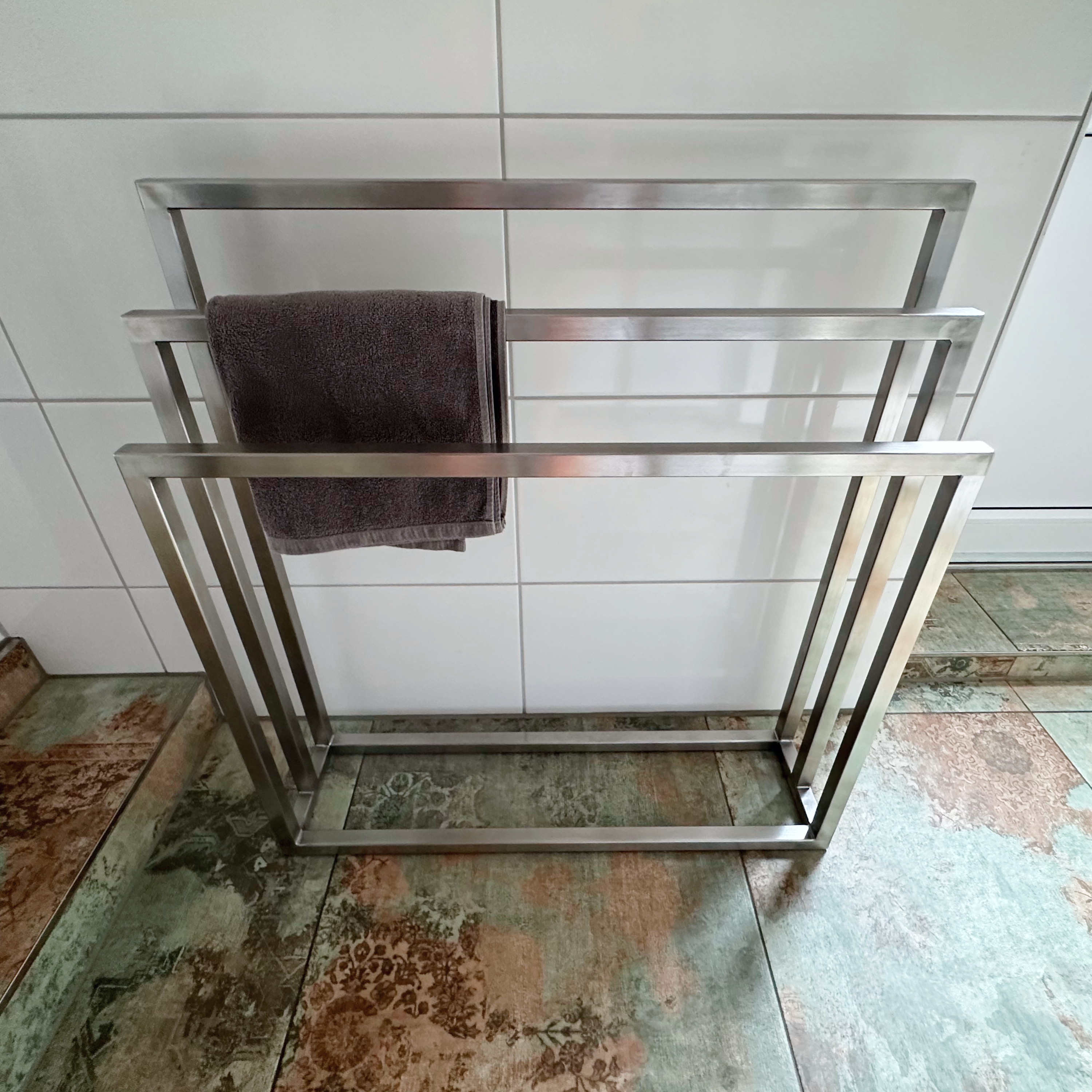 Design towel holder made of metal