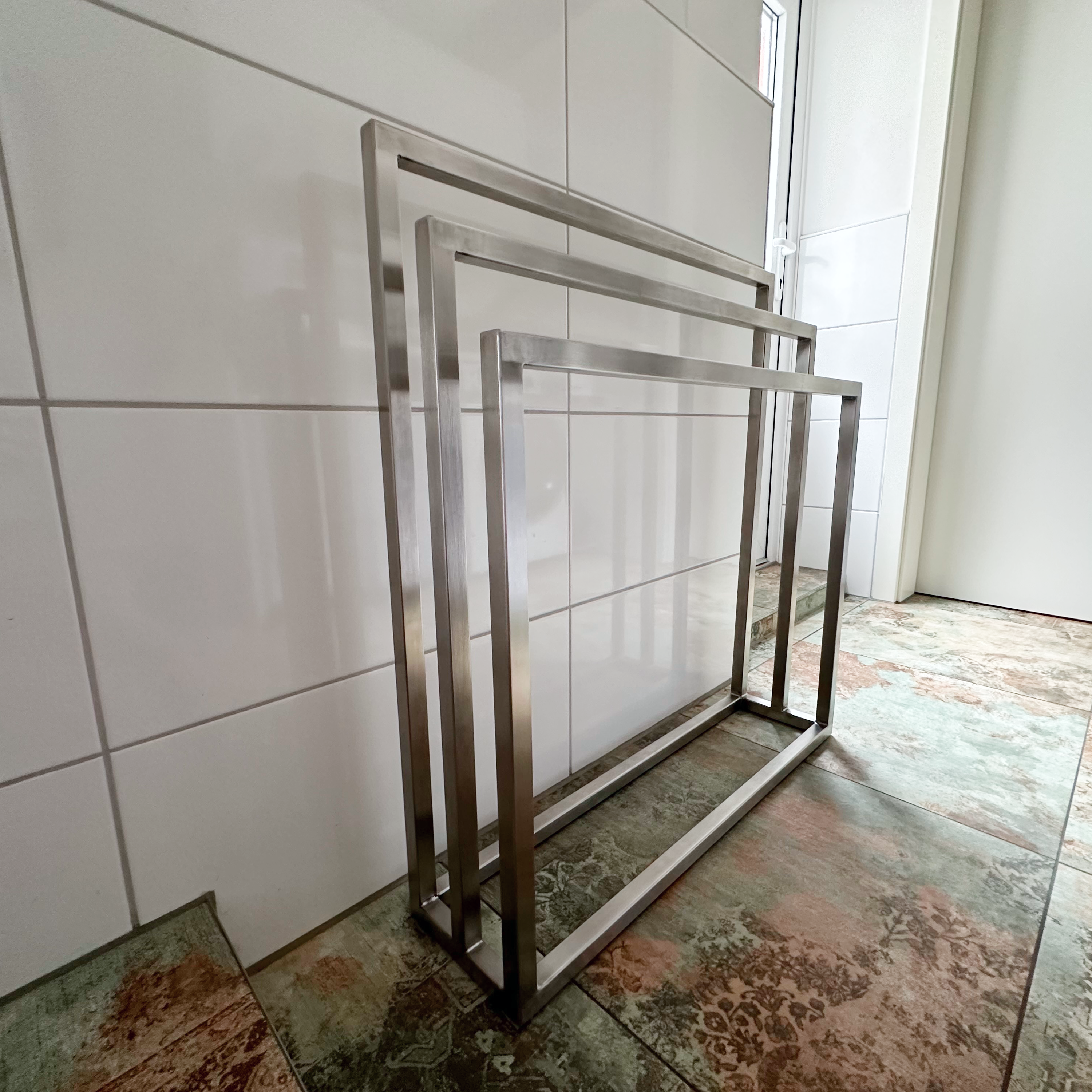 Design towel holder made of metal