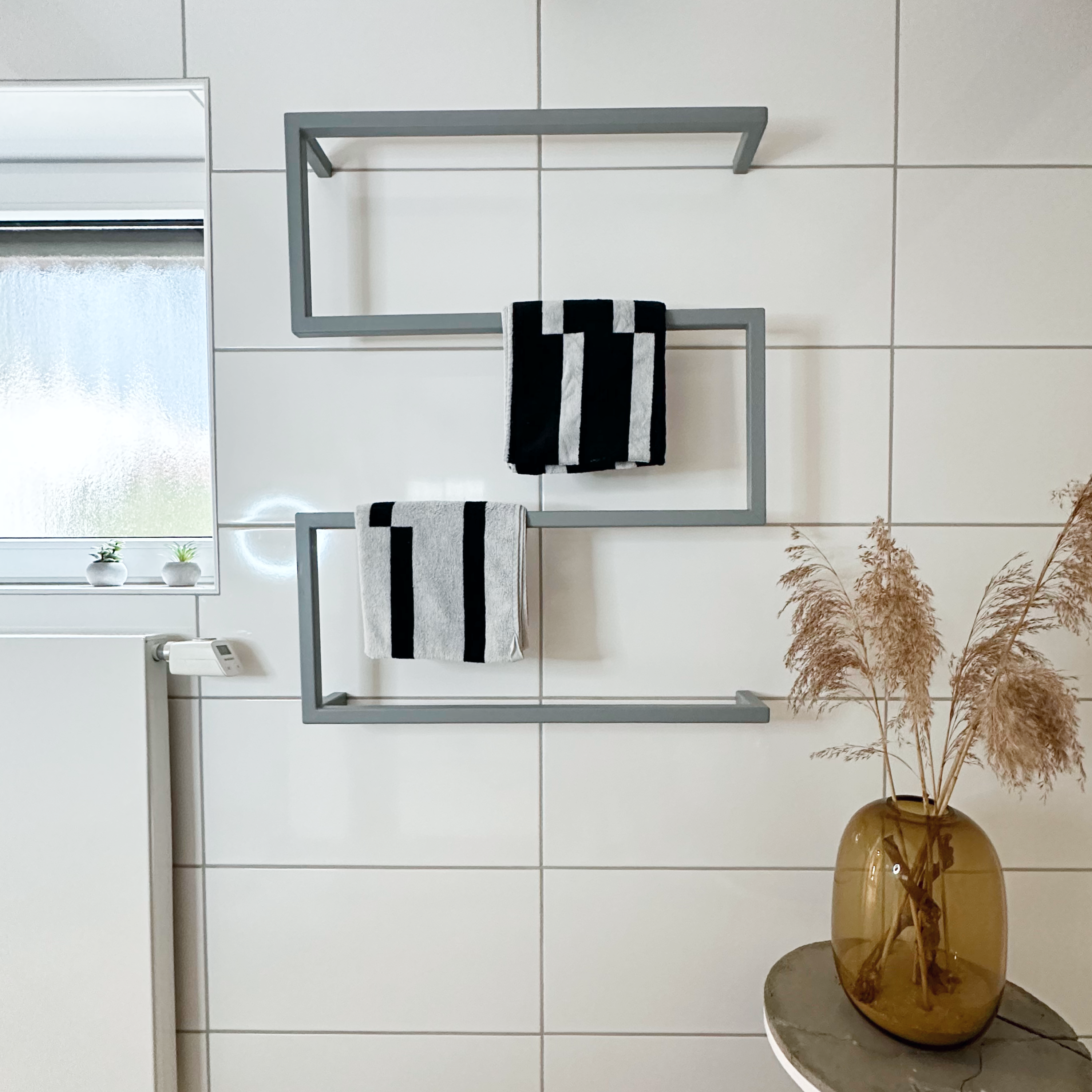 Design towel holder made of metal