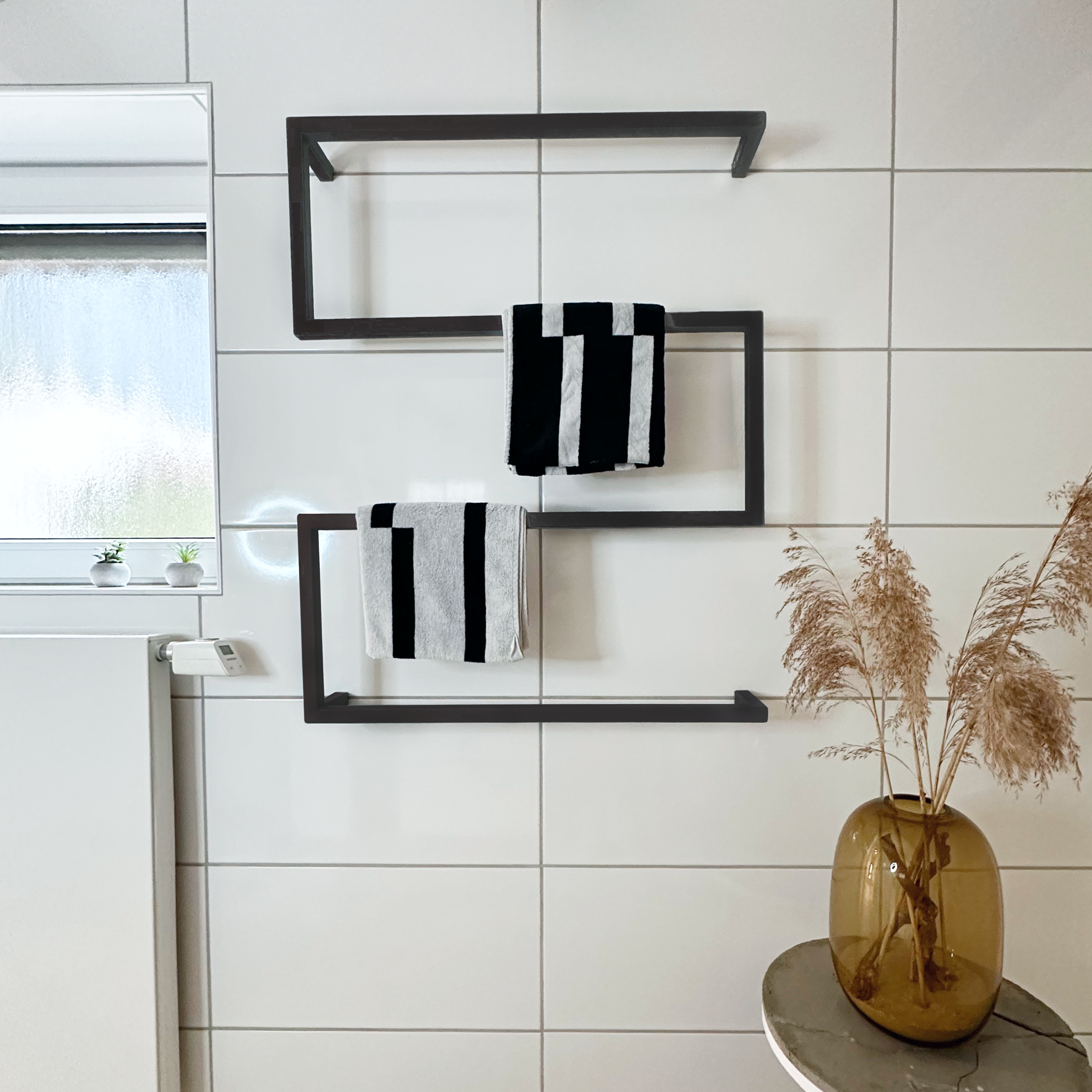 Design towel holder made of metal