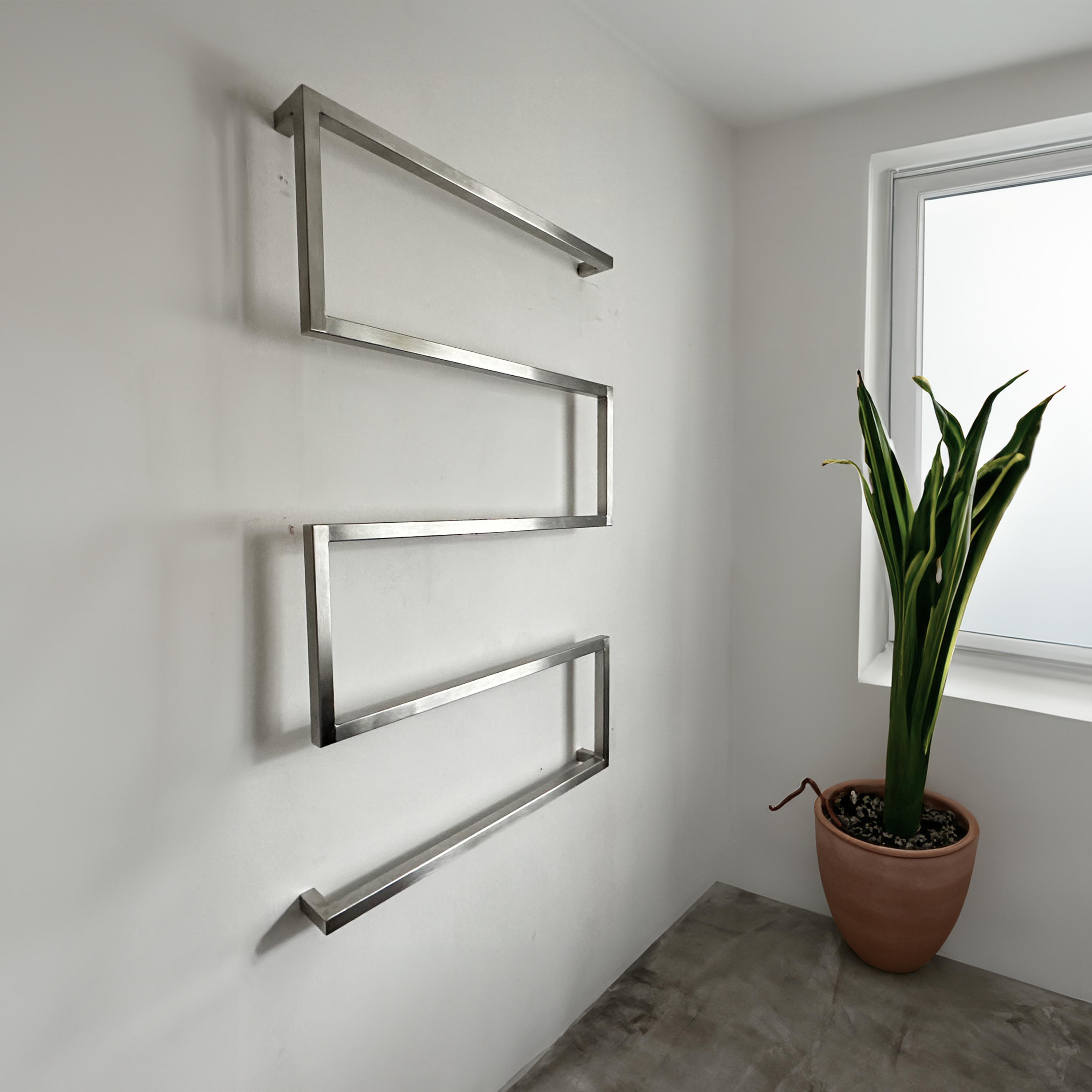 Design towel holder made of metal